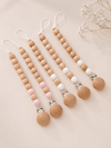 Attache-tétine — Bois & silicone